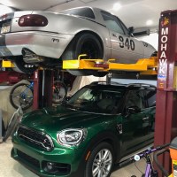 Mohawk car lift shown with wheel adaptors