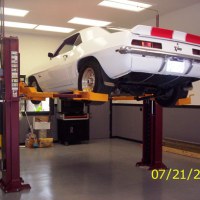 Mohawk auto lift shown with wheel adaptors