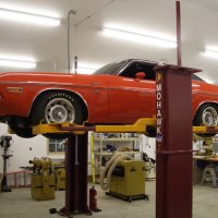 Mohawk auto lift shown with wheel adaptors