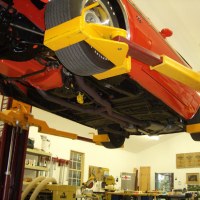 Mohawk car lift shown with wheel adaptors