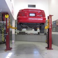 Mohawk automotive lift shown installed with low ceiling