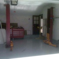 Mohawk 2 post lift shown installed with low ceiling