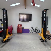 Mohawk automotive lift shown installed with low ceiling