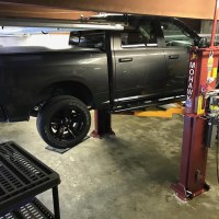 Mohawk automotive lift shown installed with low ceiling