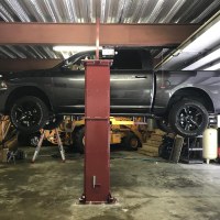 Mohawk vehicle lift shown installed with low ceiling